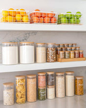 Load image into Gallery viewer, Pantry set with glass jars, baskets and spice rack. Featuring bamboo lids with silicone seal for freshness. Baskets to store fruit, potatoes and onions