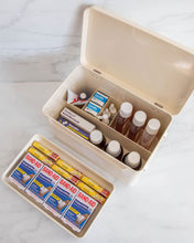 Load image into Gallery viewer, First aid container with a removable top shallow compartment, as well as several compartments within the container used to store all first aid items