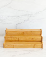 Load image into Gallery viewer, Bamboo spice rack with three tiers used to display spice jars or keep canned goods contained and organised