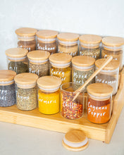 Load image into Gallery viewer, Bamboo spice rack with three tiers used to display spice jars or keep canned goods contained and organised