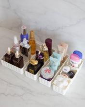 Load image into Gallery viewer, Bathroom container set designed to fit in bathroom drawers and store toiletries such as skincare, makeup, haircare and perfumes