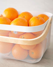 Load image into Gallery viewer, Mesh basket with wooden handle that can be used in the kitchen, laundry, wardrobe, storage cupboard, and playroom for organising and storing items