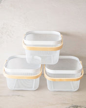 Load image into Gallery viewer, Set of three mesh baskets with wooden handles that can be used in the kitchen, laundry, wardrobe, storage cupboard, and playroom for organising and storing items