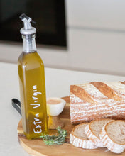 Load image into Gallery viewer, Glass oil bottle with easy to pour pourers to store oils and vinegars and use when cooking