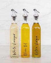 Load image into Gallery viewer, Vinyl labels set with standard oils and vinegars that peel back and stick onto glass oil bottles