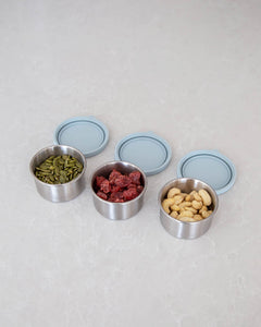 Stainless steel container with leakproof silicone lid for food storage. Perfect for storing nuts, seeds & dressings 