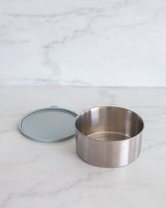 Stainless steel container with leakproof silicone lid for food storage. Perfect for storing leftovers, soups & salads