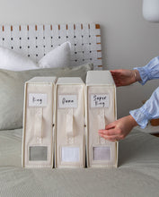 Load image into Gallery viewer, Bed sheet organisers made from Oxford cloth. Used to differentiate between different sheet sizes. Features a handle and transparent square so you can see what sheets are inside