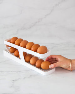 White egg tray storage dispenser keeps eggs contained, organised, and dispenses eggs easily