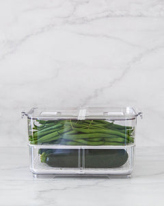 Large fridge container that is clear, strong and durable. Features removable dividers for drainage. Can be stacked. Keeps refrigerated food fresher for longer.