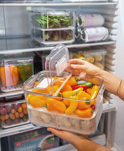 Large fridge container that is clear, strong and durable. Features removable dividers for drainage. Can be stacked. Keeps refrigerated food fresher for longer.