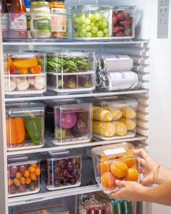 Small fridge container that is clear, strong and durable. Features removable dividers for drainage. Can be stacked. Keeps refrigerated food fresher for longer.