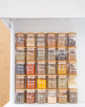 Load image into Gallery viewer, Glass and bamboo herb and spice jars used to store packets of herbs and spices in the kitchen