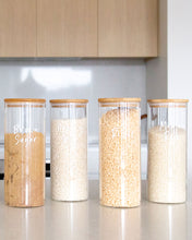 Load image into Gallery viewer, Glass jar with a bamboo lid and silicone seal for storing oats, muesli and rice