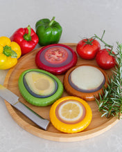 Load image into Gallery viewer, Reusable silicone food saver pods for lemon, avocado, tomato and onion, dishwasher safe containers that help extend freshness and reduce waste
