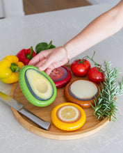 Load image into Gallery viewer, Reusable silicone food saver pods for lemon, avocado, tomato and onion, dishwasher safe containers that help extend freshness and reduce waste