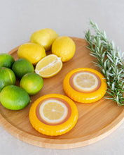 Load image into Gallery viewer, Silicone lemon saver pod with flexible lid designed to keep cut lemons fresh and prevent drying