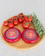 Load image into Gallery viewer, Silicone tomato saver pod with flexible lid designed to keep cut tomatoes fresh and prevent drying
