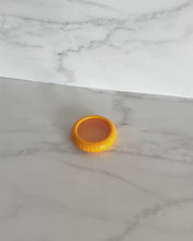 Load image into Gallery viewer, Silicone lemon saver pod with flexible lid designed to keep cut lemons fresh and prevent drying