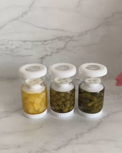 Load image into Gallery viewer, Glass pickle jar in hourglass shape to separate brine from pickles, olives, or other canned goods. Features airtight white silicone lid