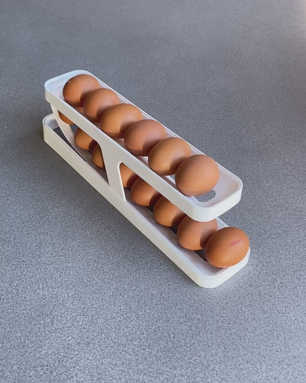 White egg tray storage dispenser keeps eggs contained, organised, and dispenses eggs easily