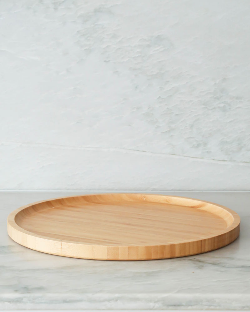 Bamboo round tray used to place items on for storage or display in all areas of your home