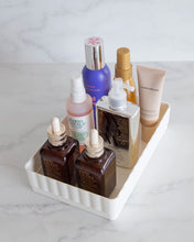 Load image into Gallery viewer, White bathroom container designed to fit in bathroom drawers and store toiletries such as skincare, makeup, haircare and perfumes