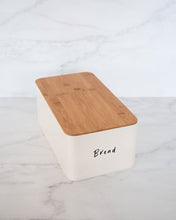 Load image into Gallery viewer, Cream coloured carbon steel container sealed with a bamboo lid and a silicone seal, used to store biscuits, crackers, and bread