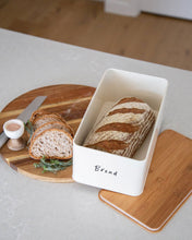 Load image into Gallery viewer, Cream coloured carbon steel container sealed with a bamboo lid and a silicone seal, used to store biscuits, crackers, and bread