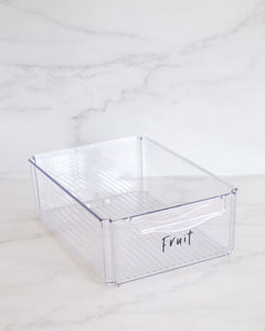 Fridge container that is medium, clear and stackable, used to store dairy, meat and vegetables in the fridge