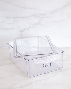 Fridge container that is medium, clear and stackable, used to store dairy, meat and vegetables in the fridge