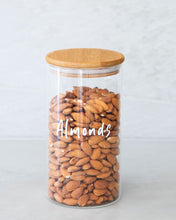 Load image into Gallery viewer, Glass jar with a bamboo lid and silicone seal for storing nuts, tea, and rice