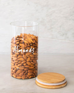 Glass jar with a bamboo lid and silicone seal for storing nuts, tea, and rice