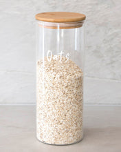 Load image into Gallery viewer, Glass jar with a bamboo lid and silicone seal for storing oats, muesli and rice