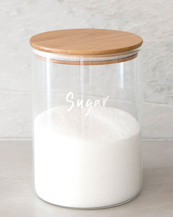 Glass jar with a bamboo lid and silicone seal for storing flour and sugar