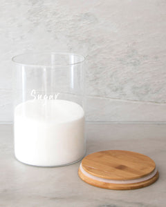 Glass jar with a bamboo lid and silicone seal for storing flour and sugar