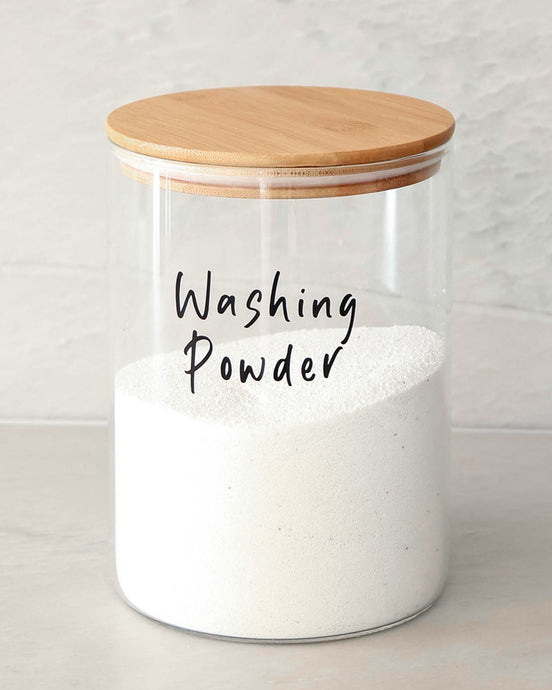 Washing powder glass jar with bamboo lid used to store washing powder or other laundry items
