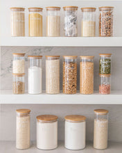 Load image into Gallery viewer, Pantry glass jars with bamboo lid and silicone seal used to store essential household pantry ingredients such as flour, sugar and spaghetti 