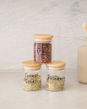 Load image into Gallery viewer, Vinyl labels set in black or white with standard herb and spice labels that peel back and stick onto kitchen jars