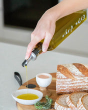 Load image into Gallery viewer, Glass oil bottle with easy to pour pourers to store oils and vinegars and use when cooking