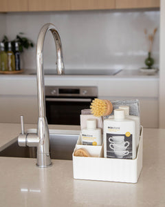 Under sink storage container to store dishwashing liquid, cloths, plugs, soap and more